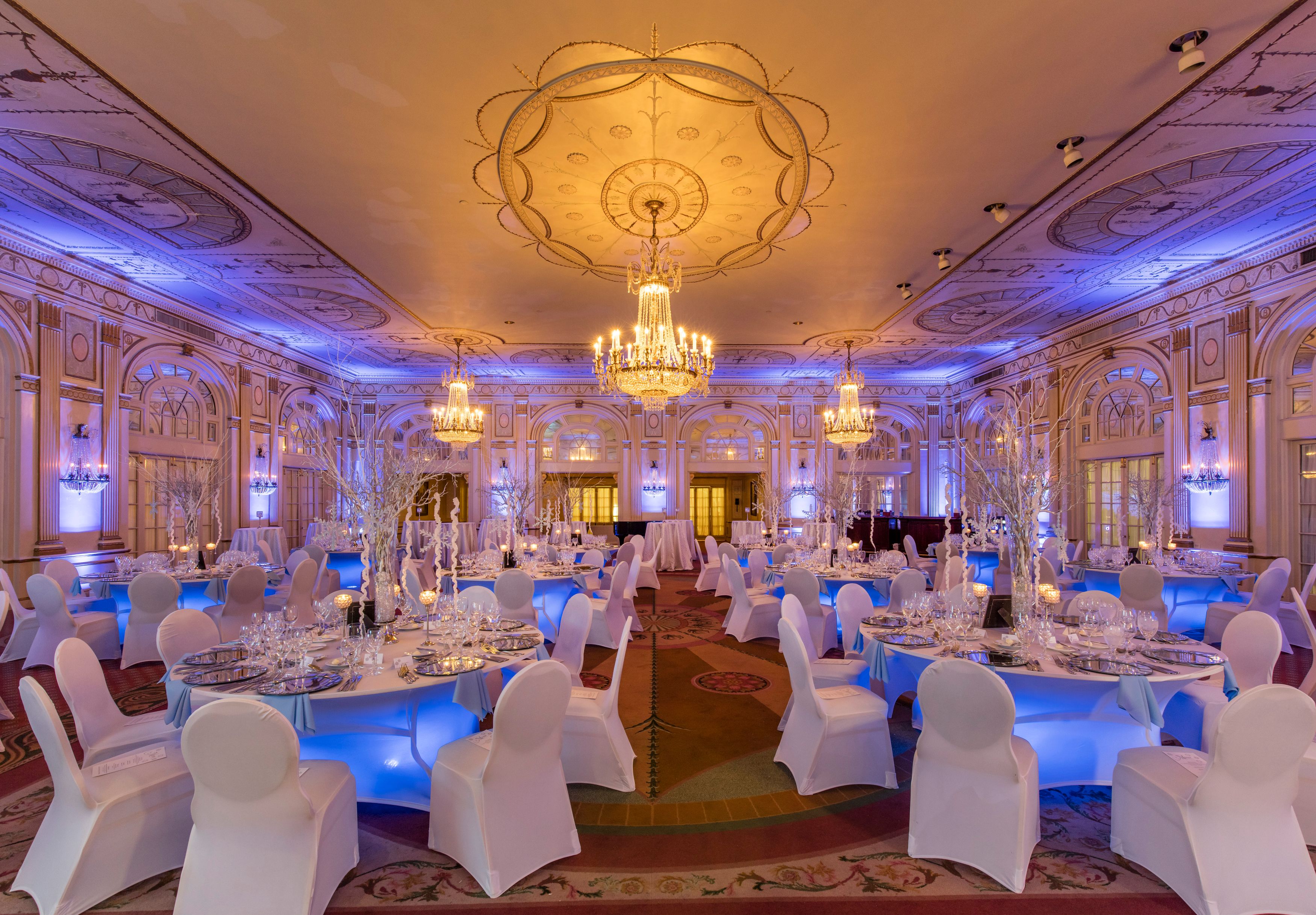 a room with tables and chairs