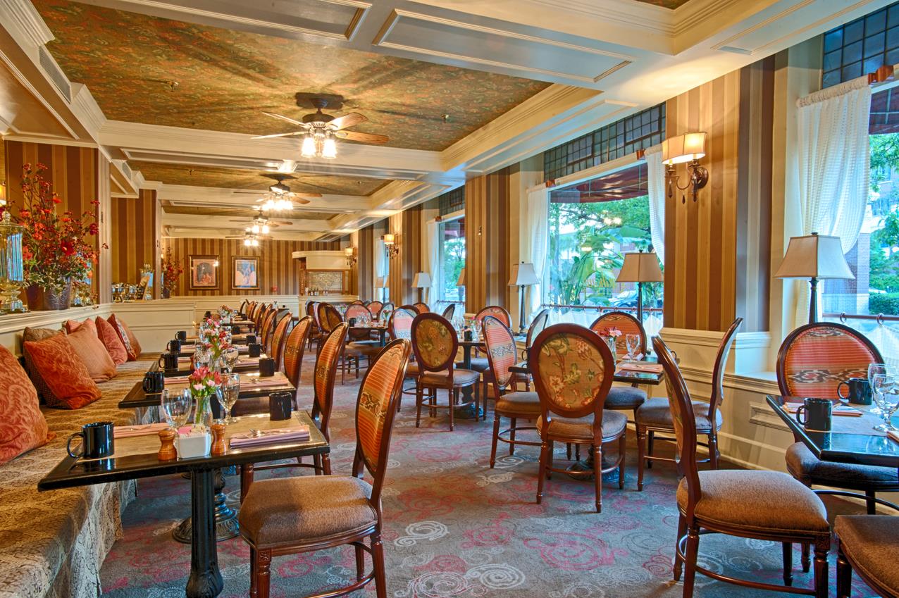 a room with tables and chairs