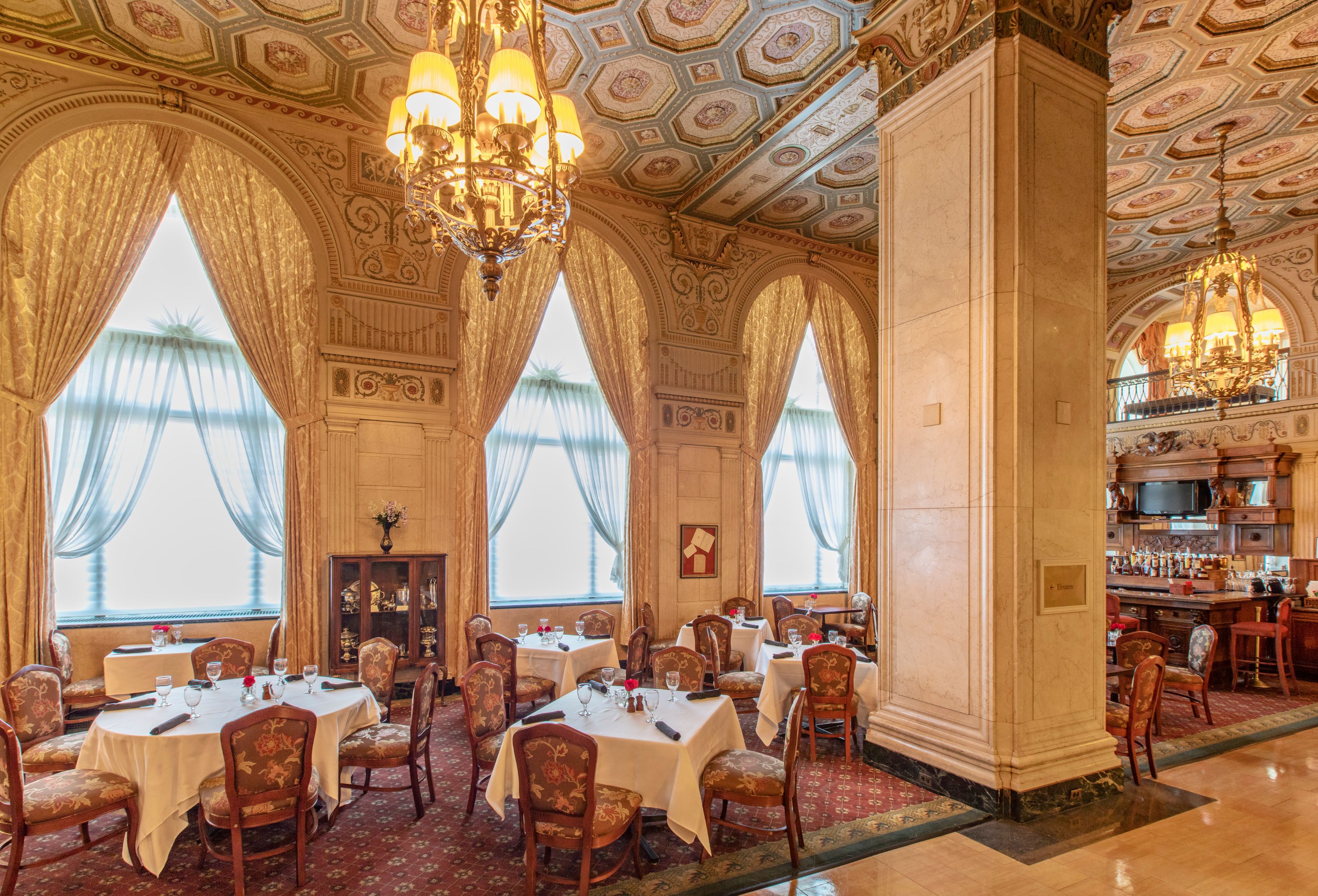 a room with tables and chairs