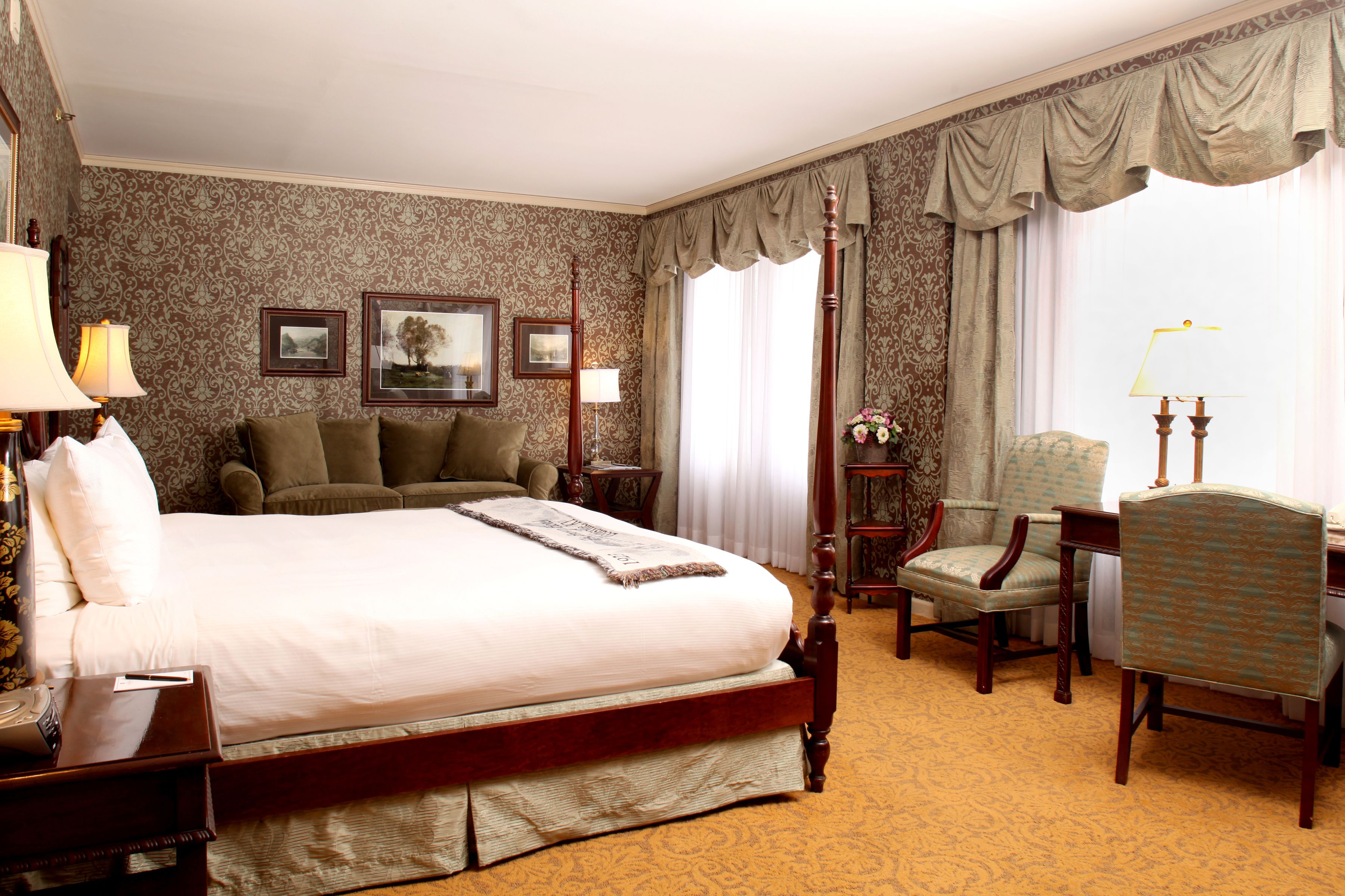 a room with a bed and a chair