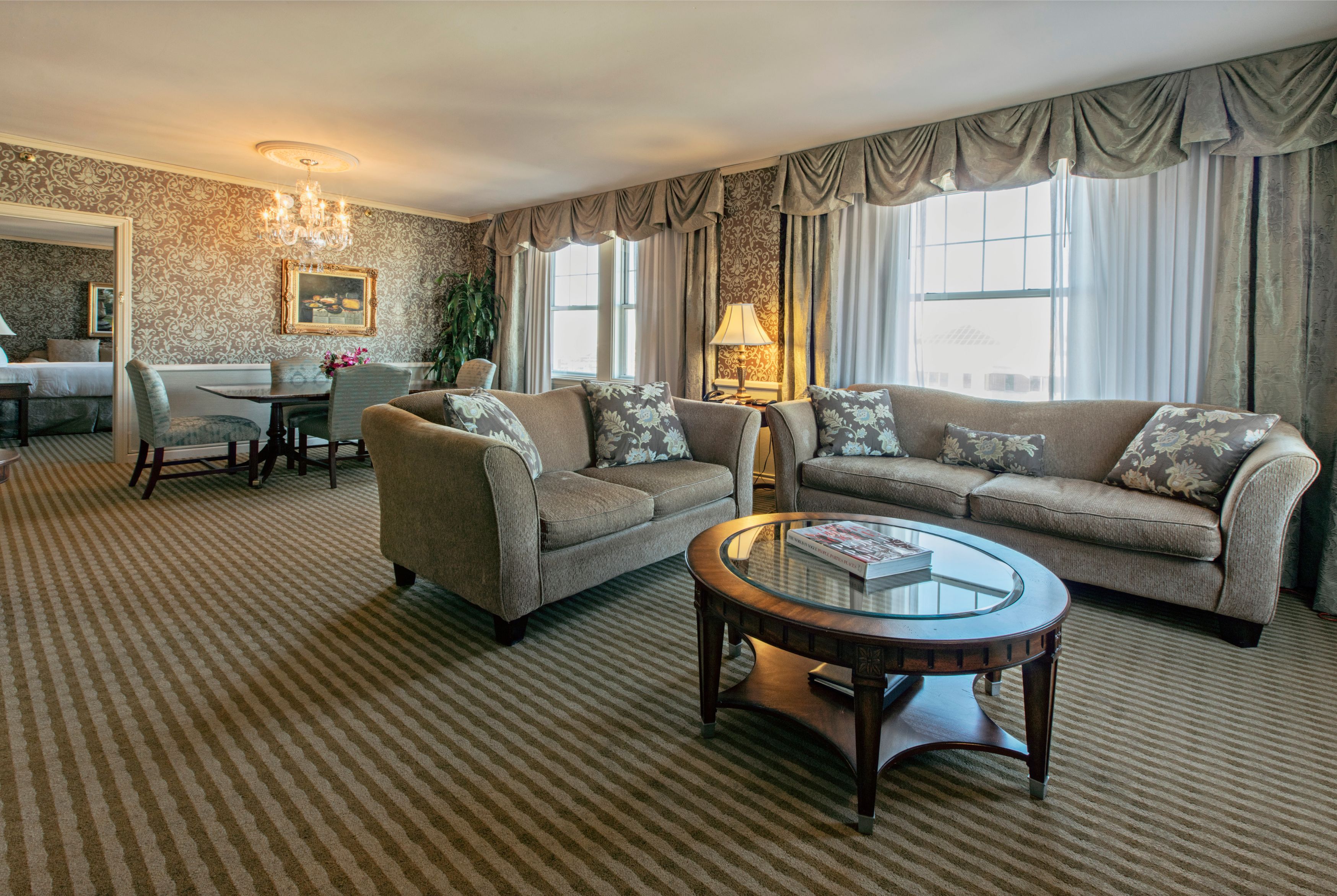 a living room with couches and a table