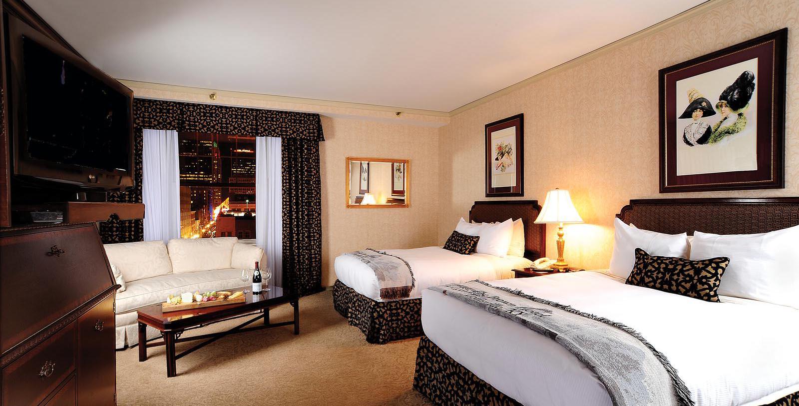 a hotel room with two beds