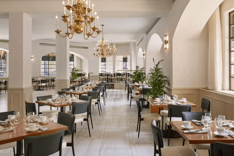 a room with tables and chairs