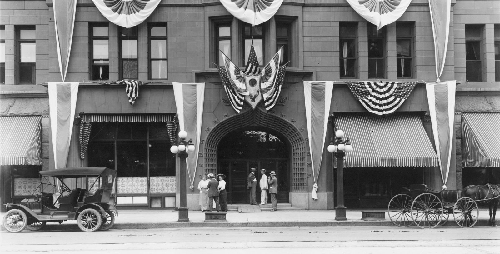 a group of people standing outside a building