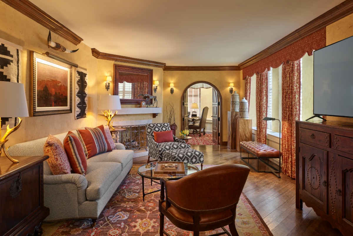 a living room with a couch and a table