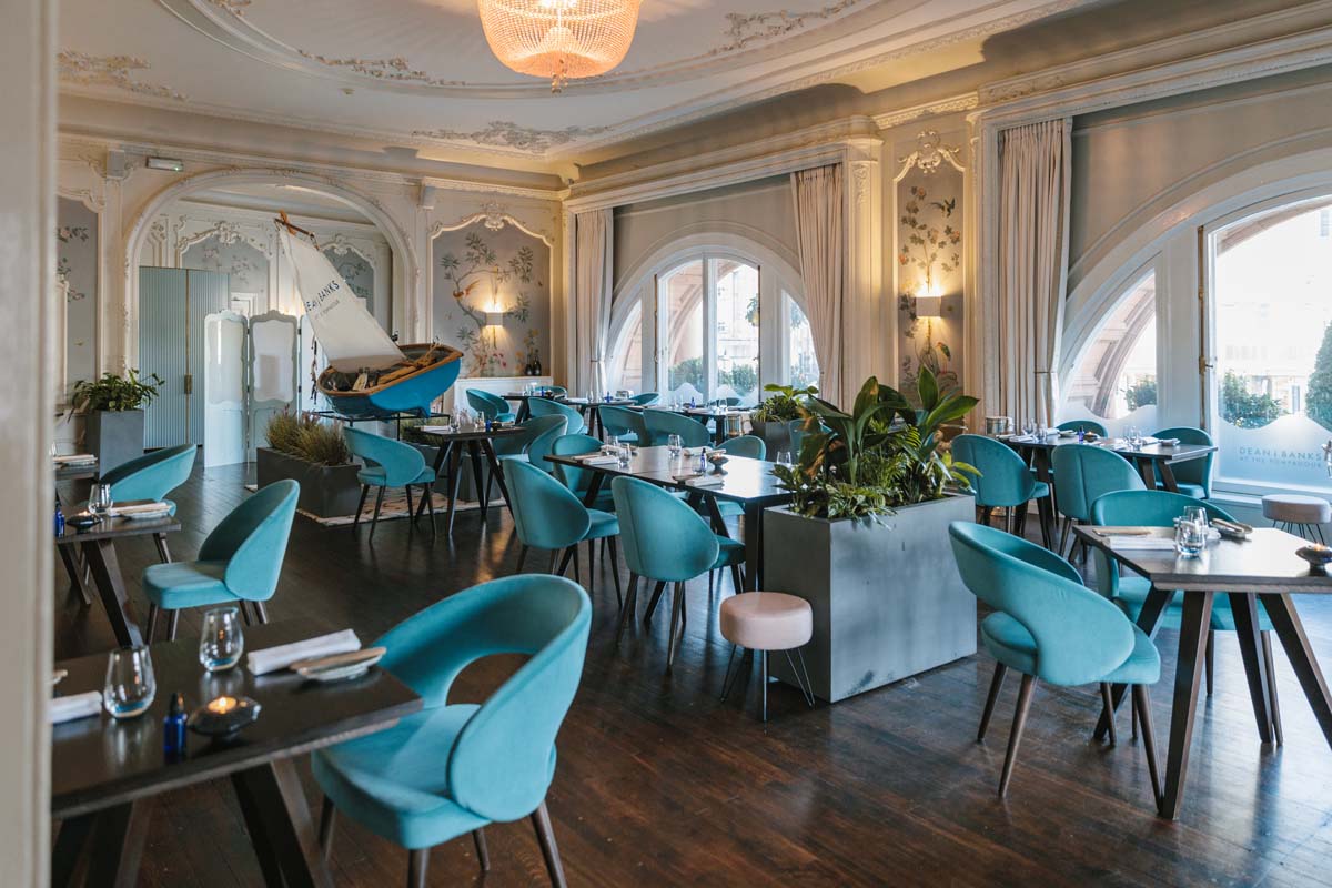 a room with tables and chairs