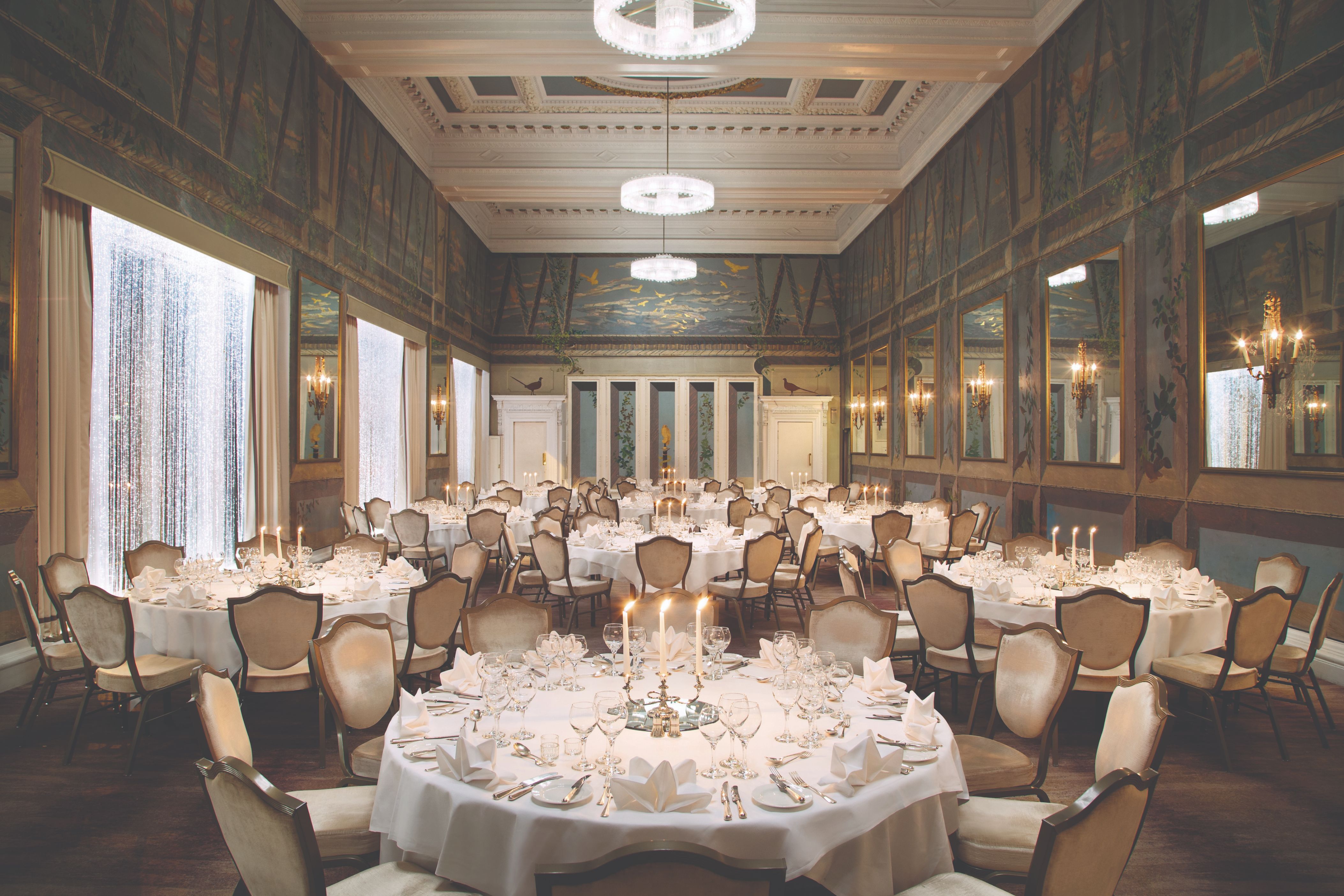 a room with tables and chairs