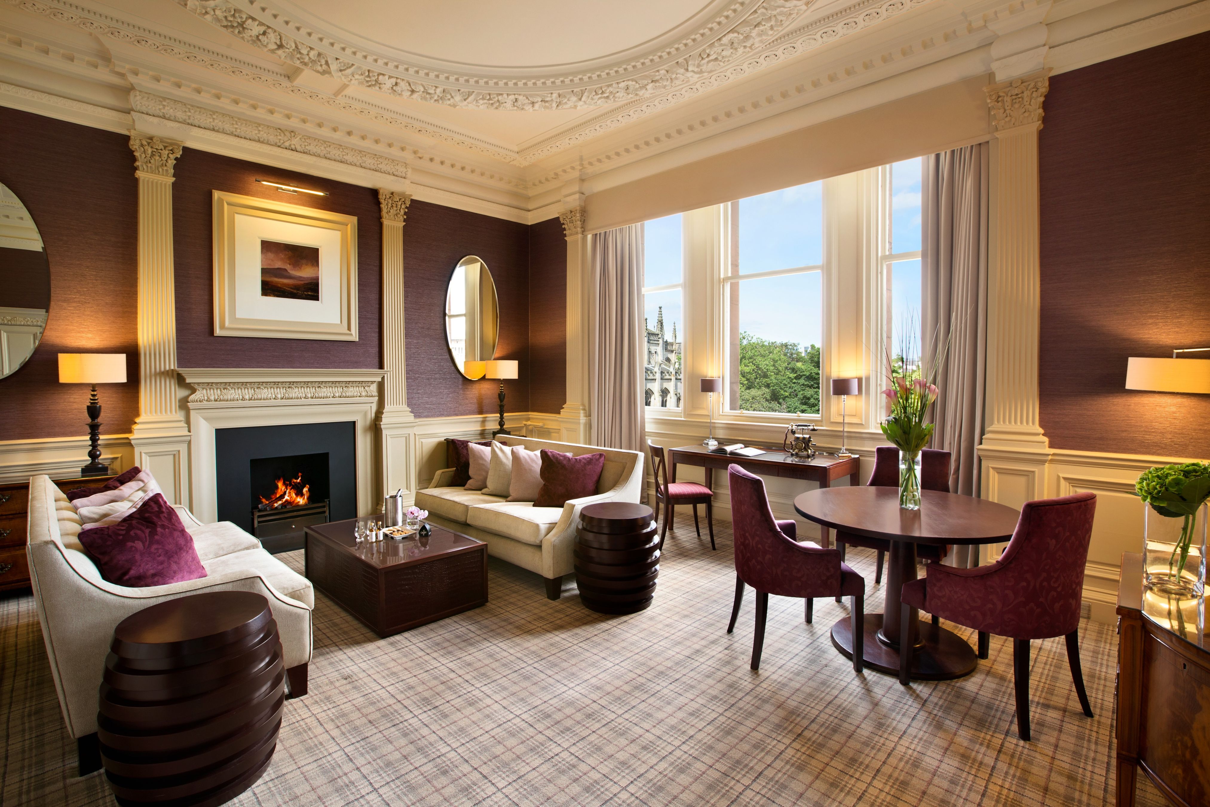 a room with a fireplace and furniture