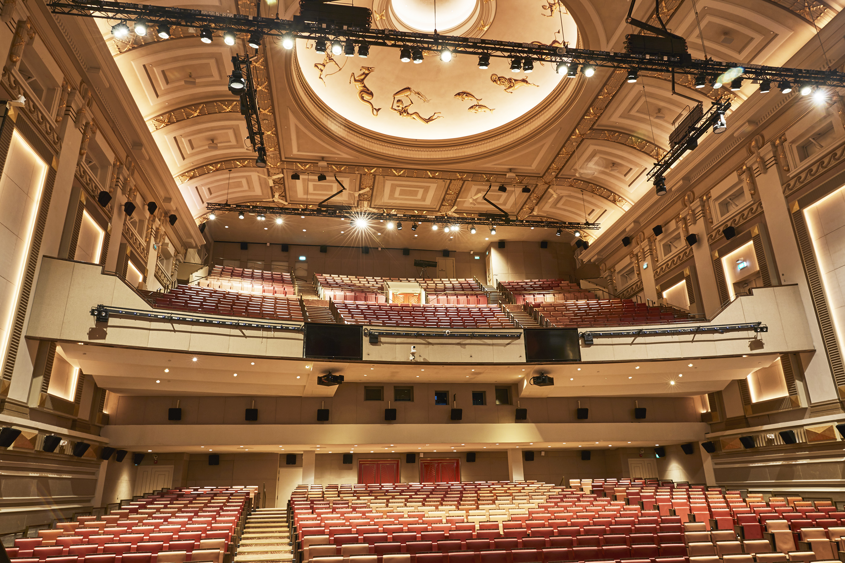 a large auditorium with rows of seats