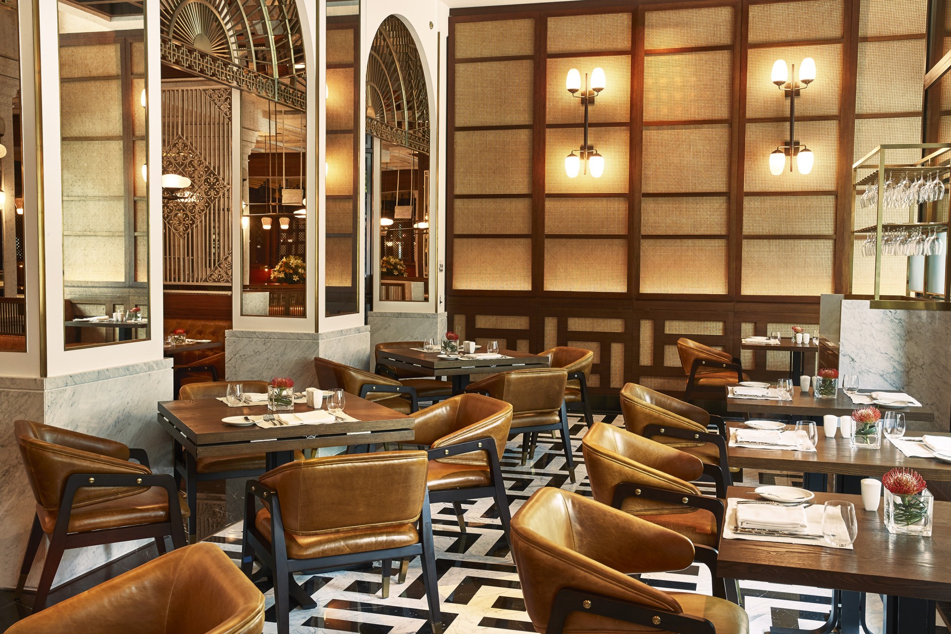 a restaurant with tables and chairs