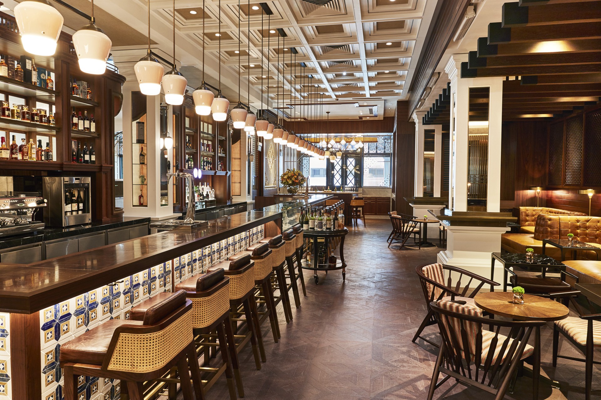 a bar with chairs and tables