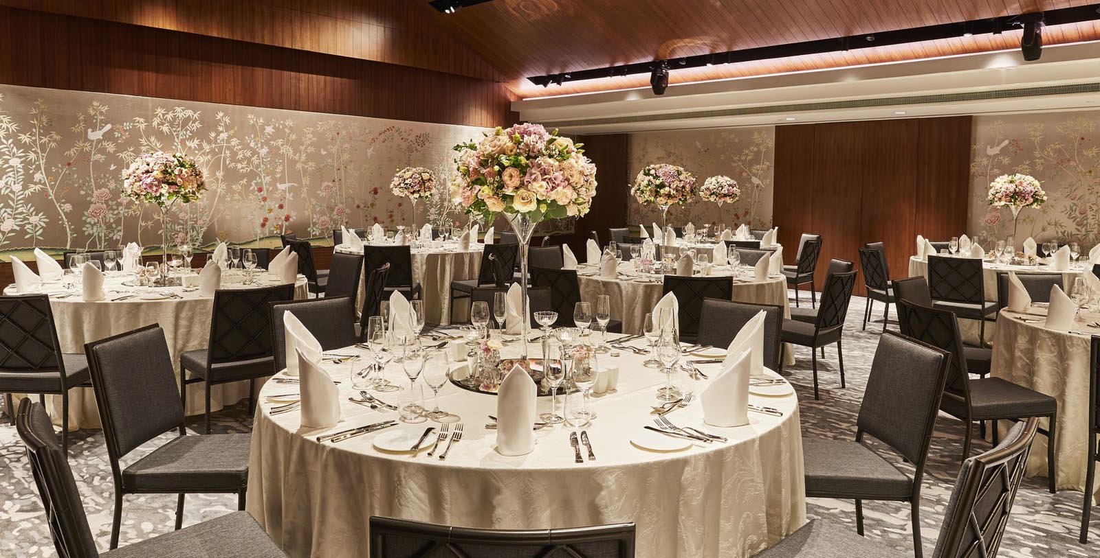 a round table set for a wedding reception