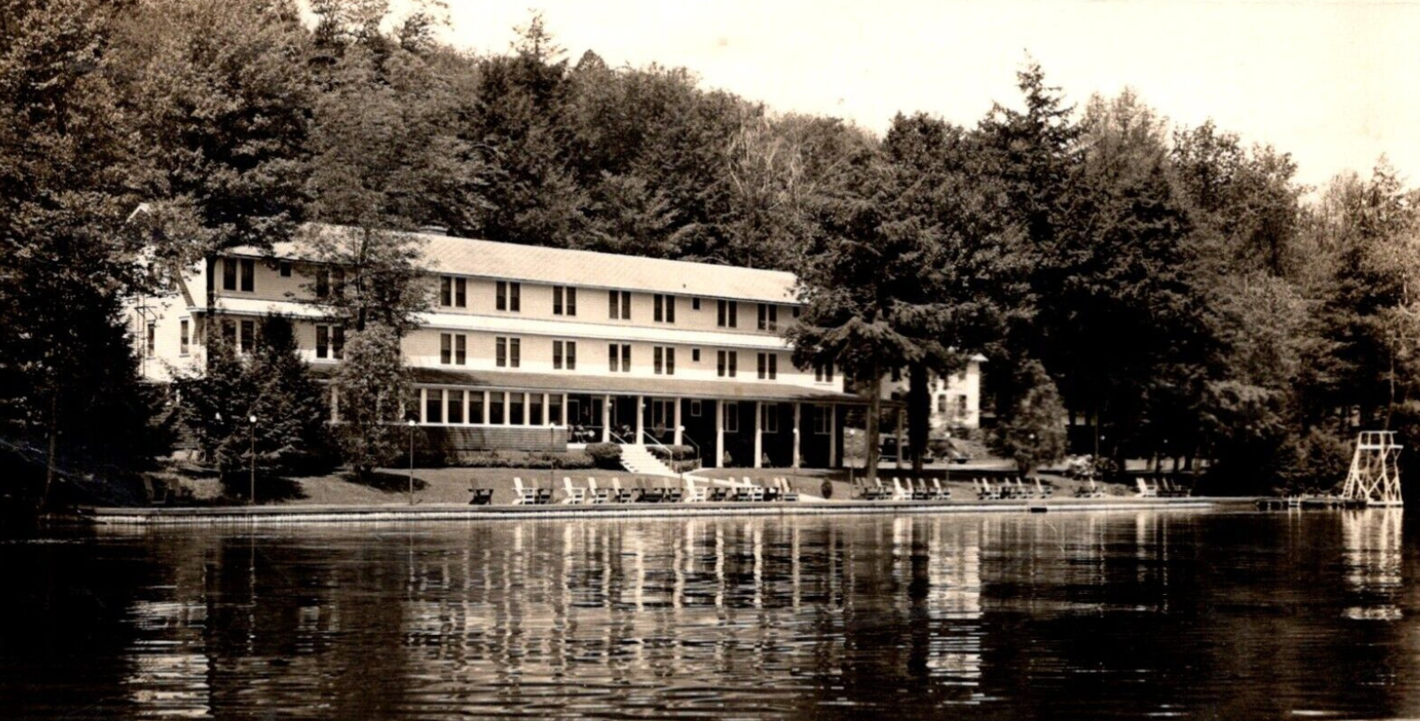 a building next to a lake