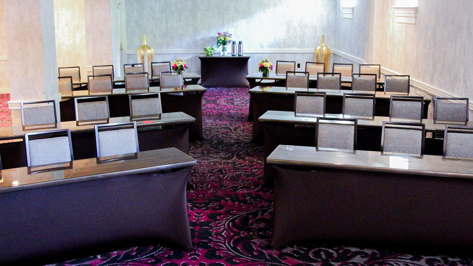 a room with tables and chairs