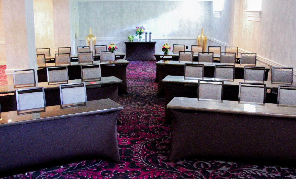 a room with tables and chairs