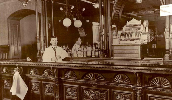 a man behind a bar