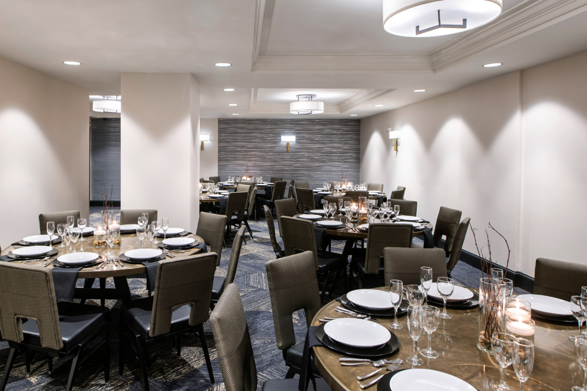 a room with tables and chairs