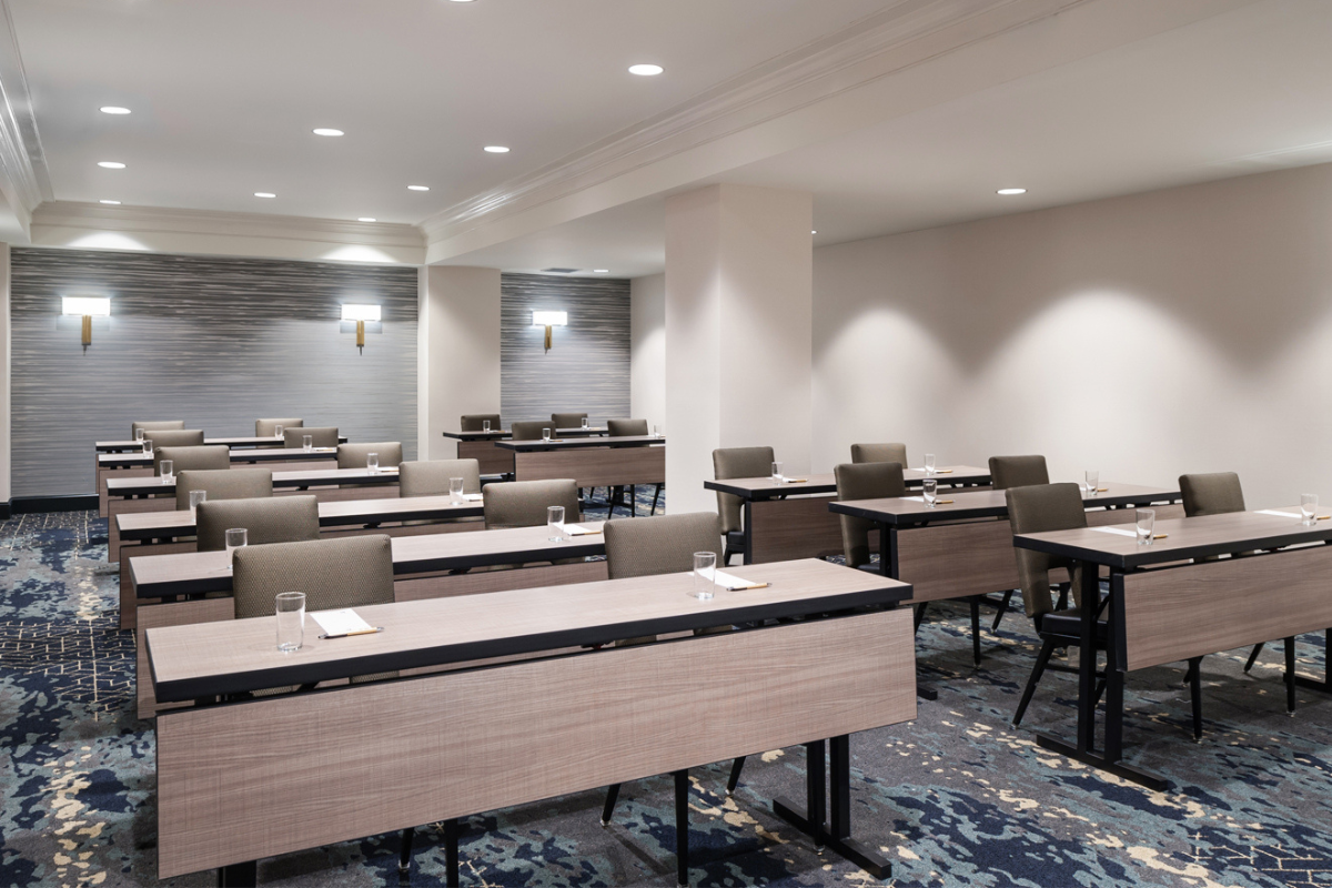 a room with tables and chairs