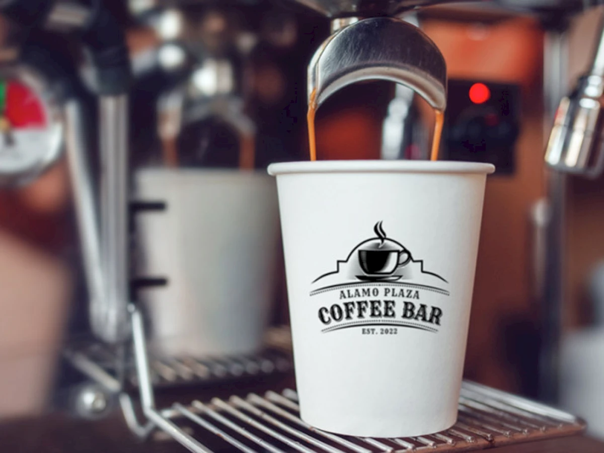 a coffee machine with a cup of coffee