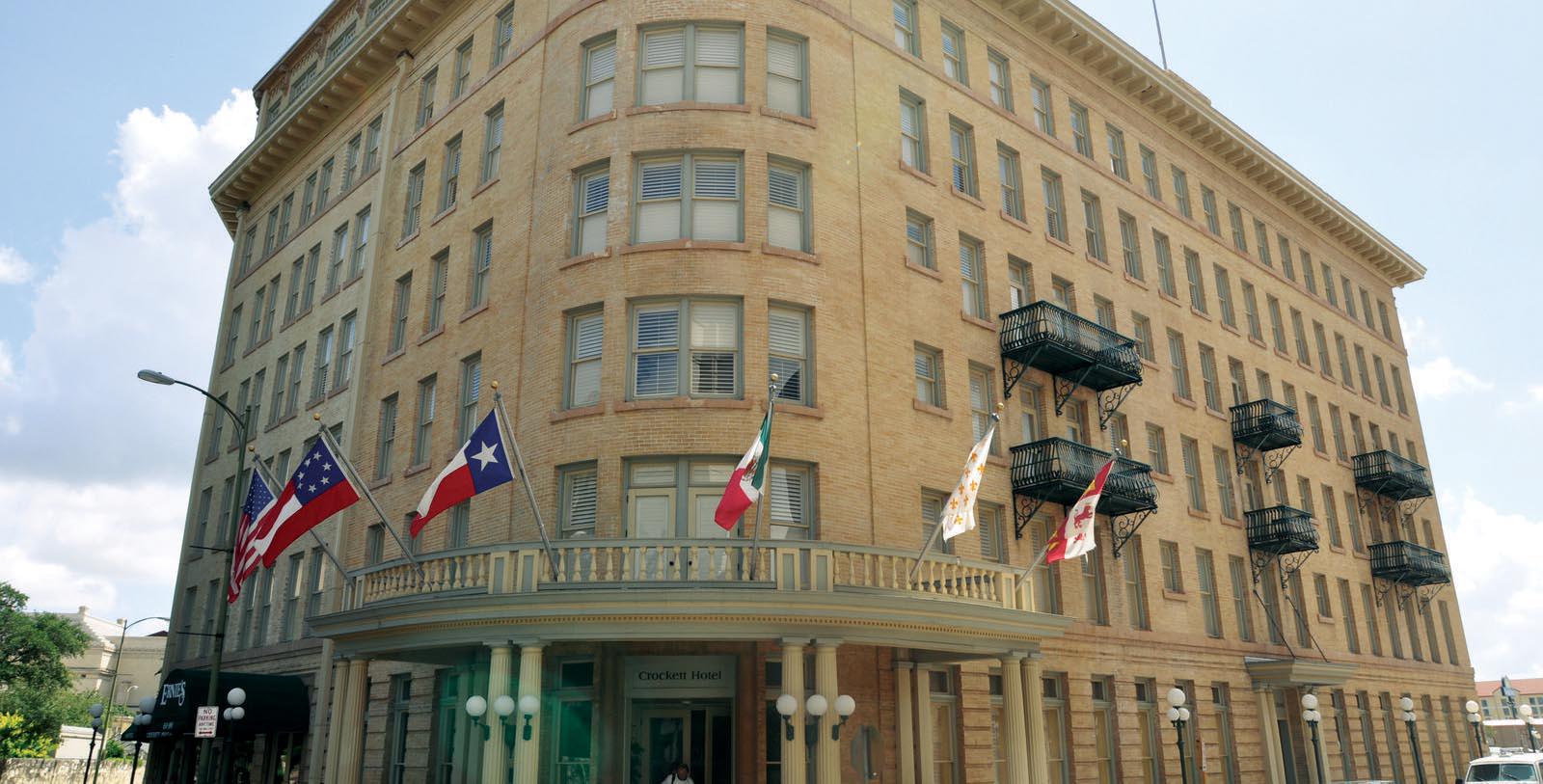 a building with flags on the front