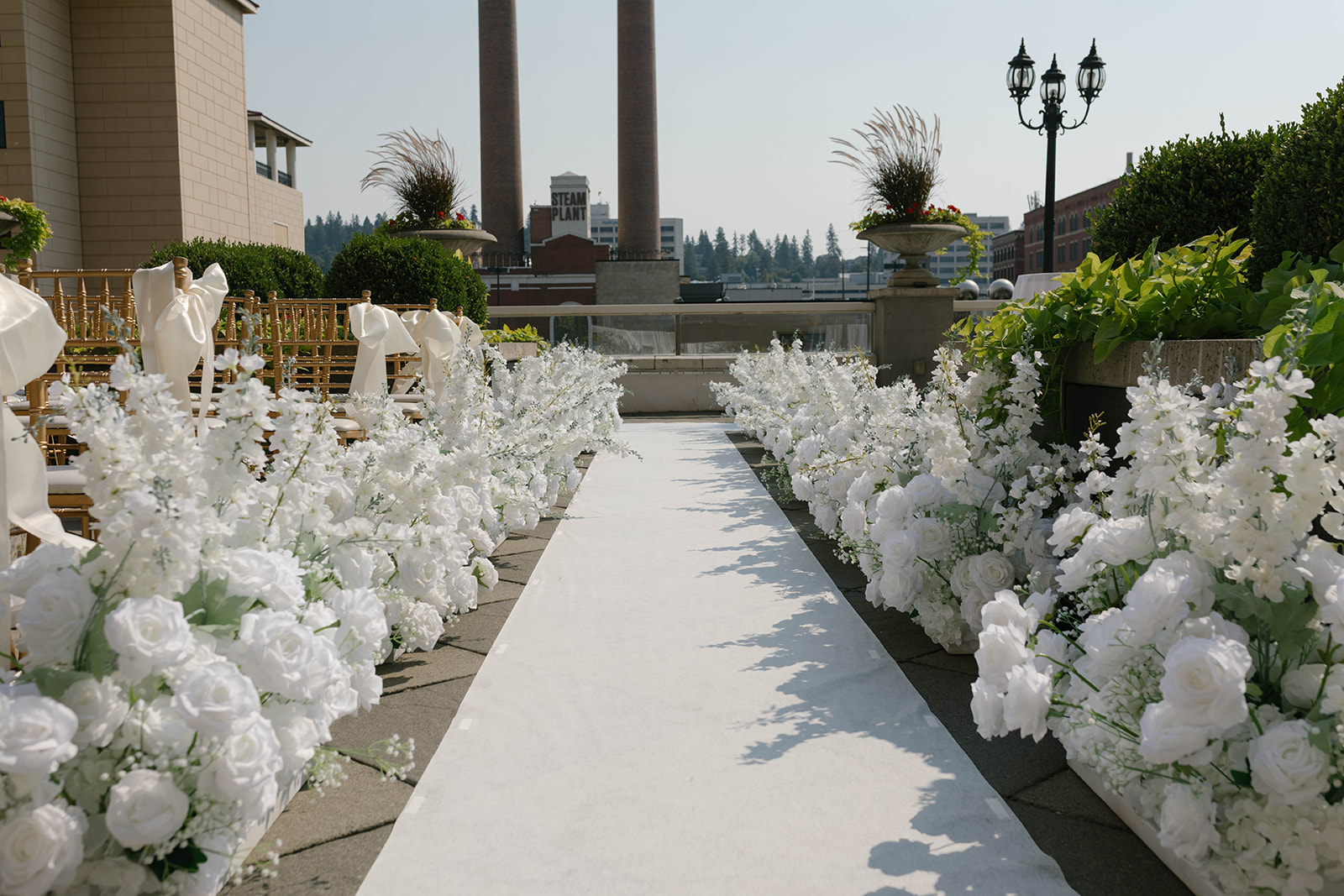 a white carpet with flowers in front of a building