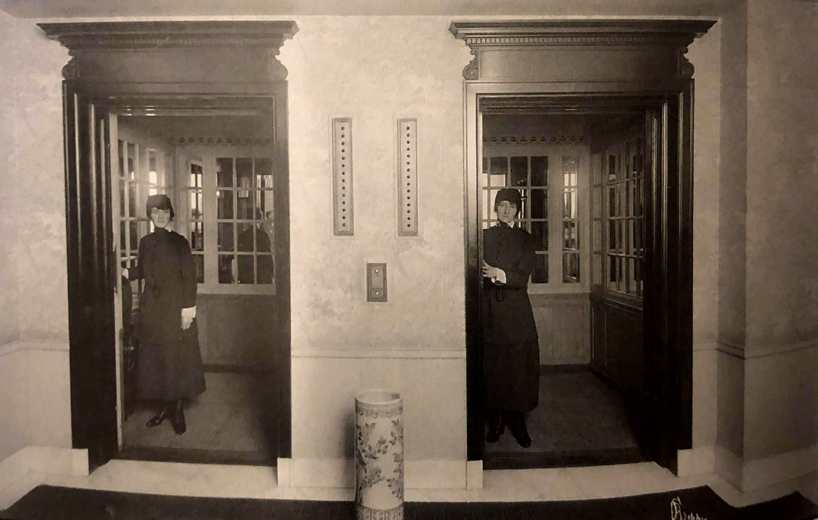a woman standing in front of a door