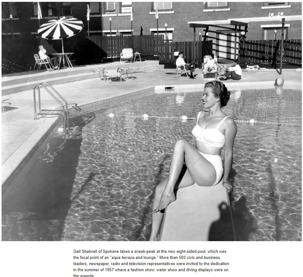 a woman sitting on a pool edge