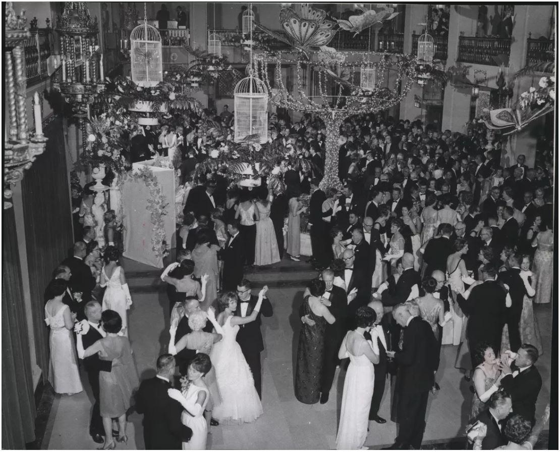 a group of people dancing in a room