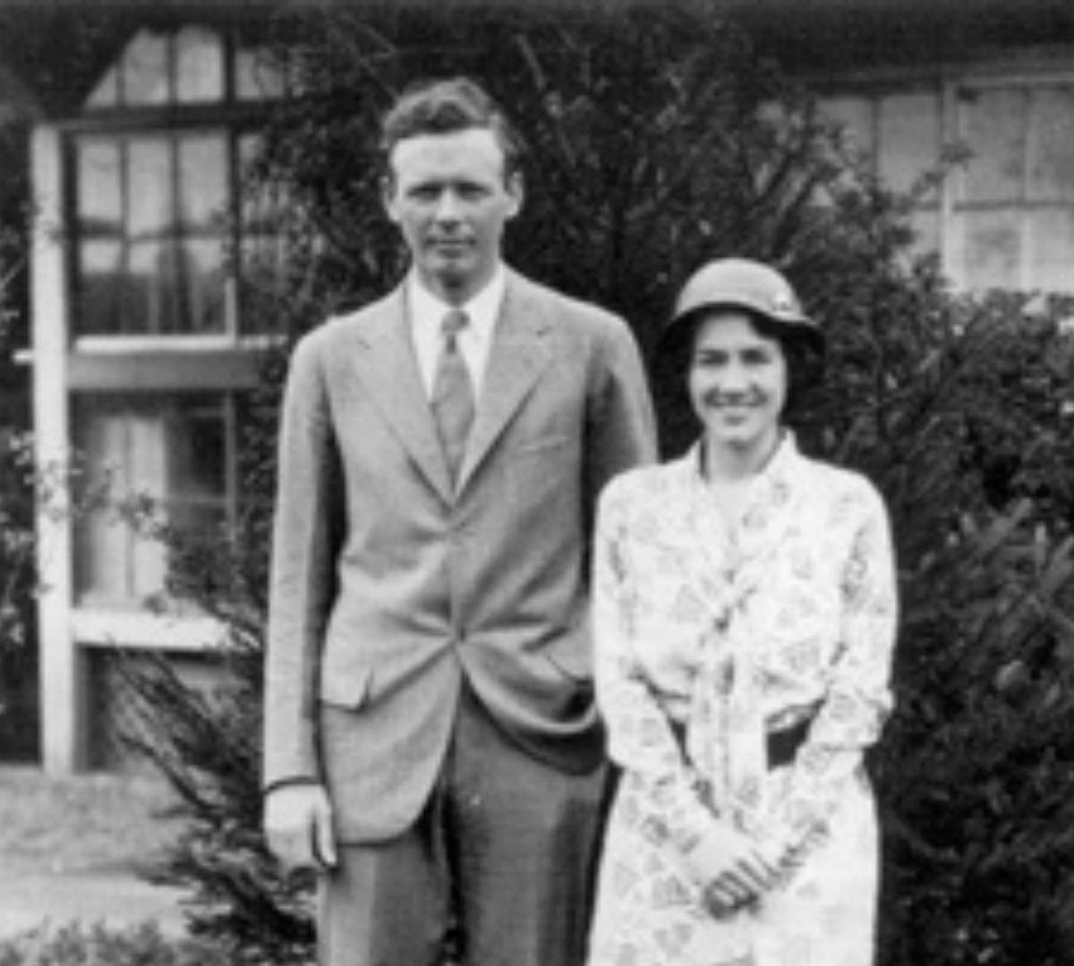 a man and woman standing together