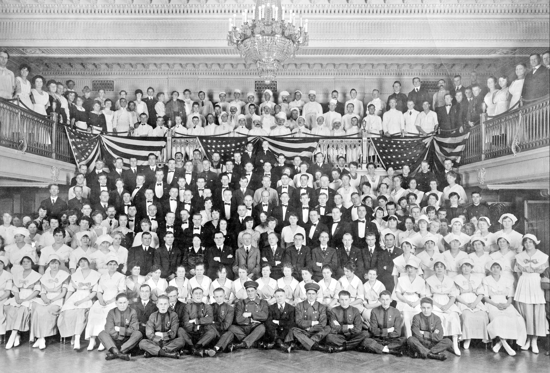 a group of people in a large room