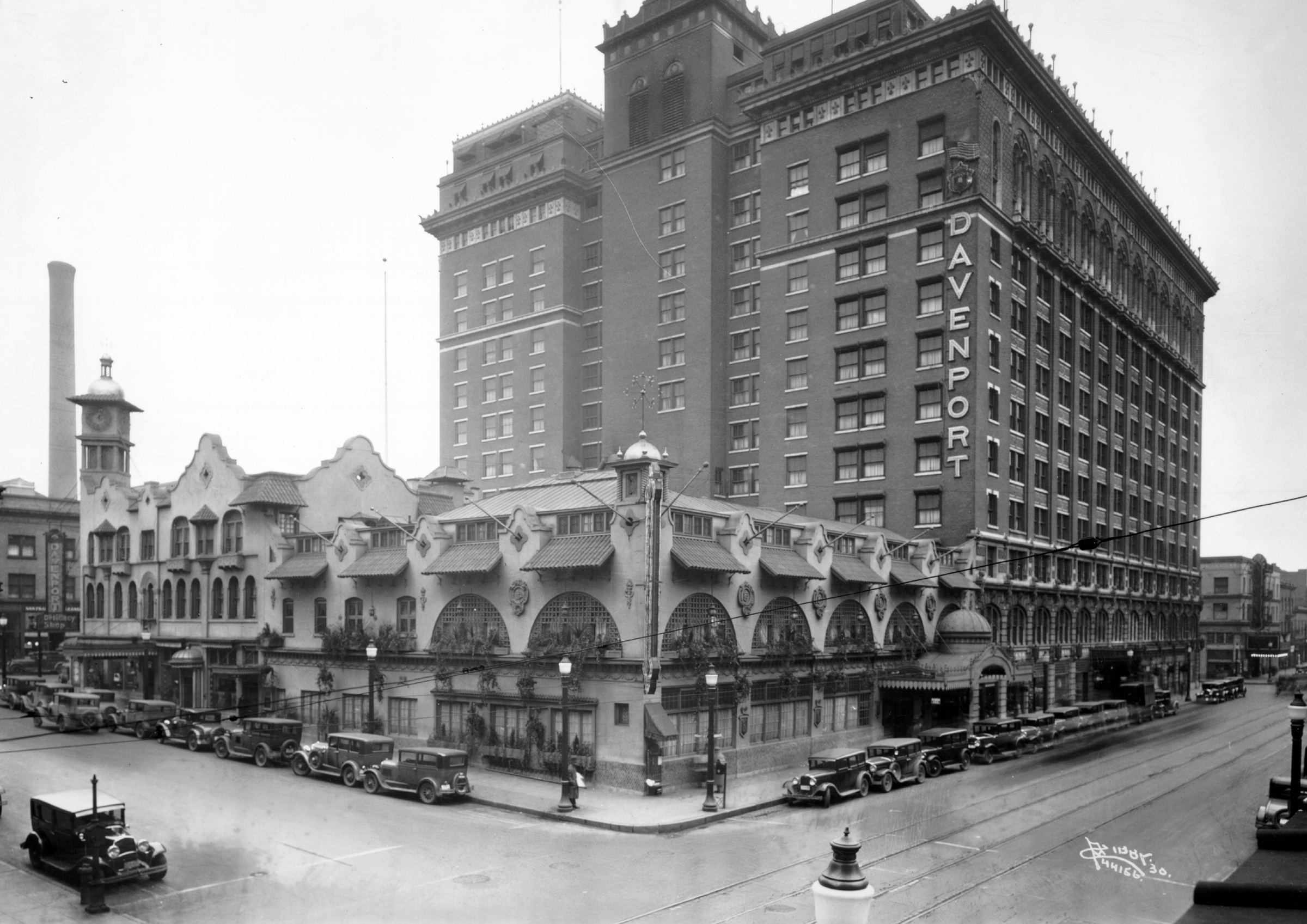 a building with cars parked on the side of it