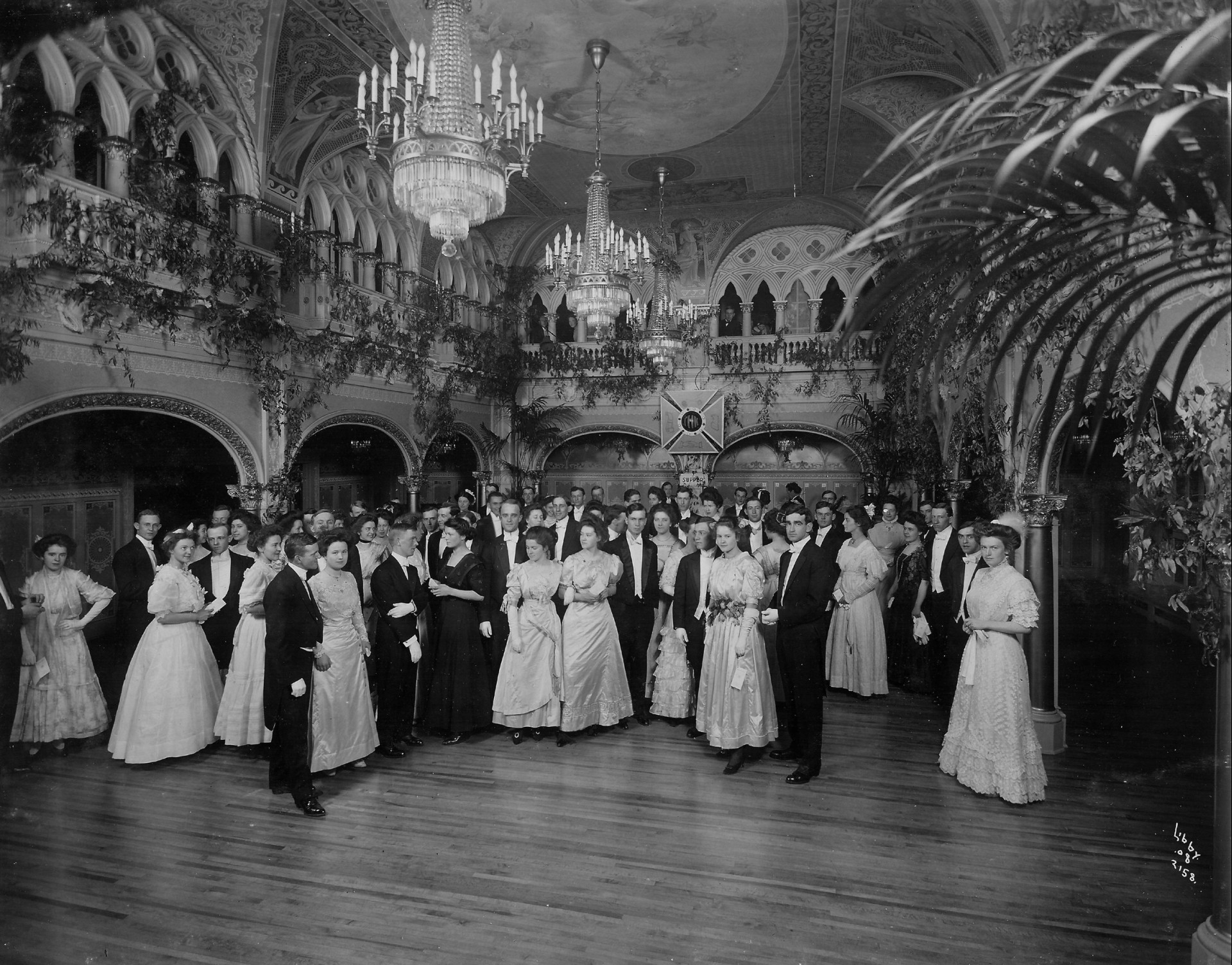 a group of people in formal attire