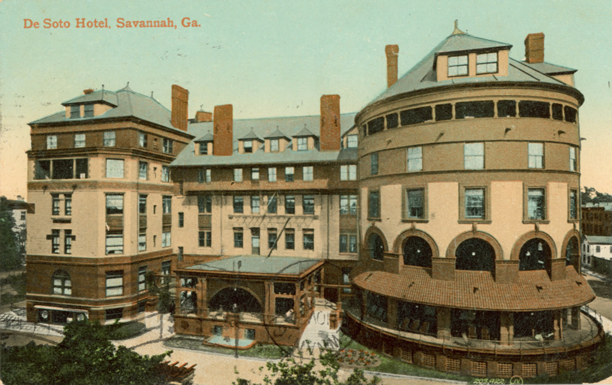 a large building with a pool