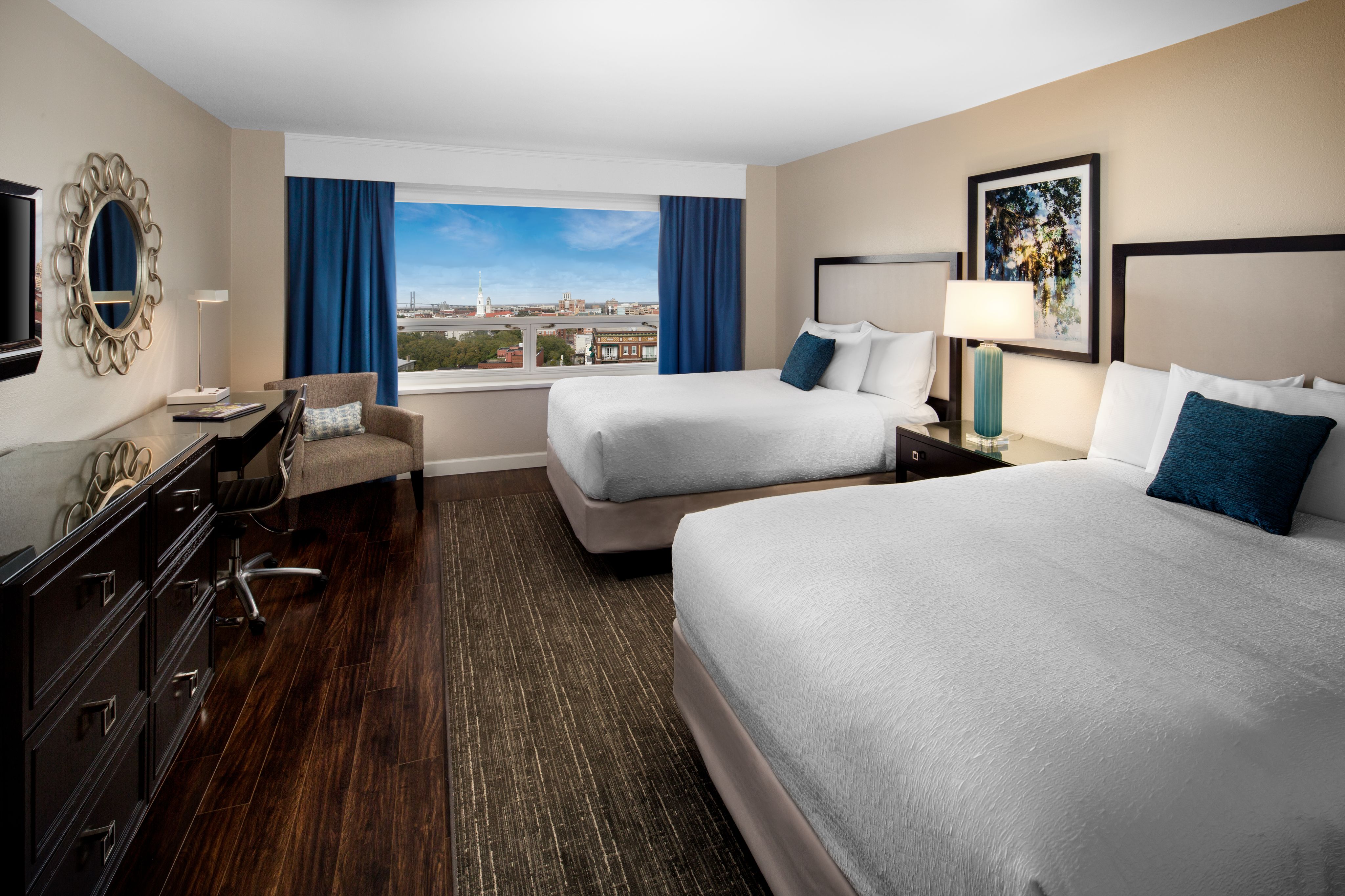 a hotel room with two beds