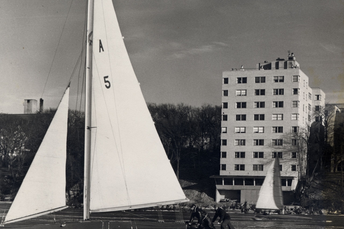 a group of people sailing on ice