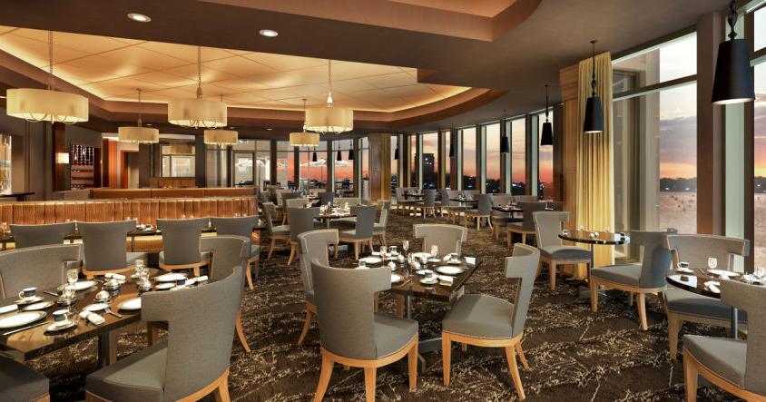 a restaurant with tables and chairs
