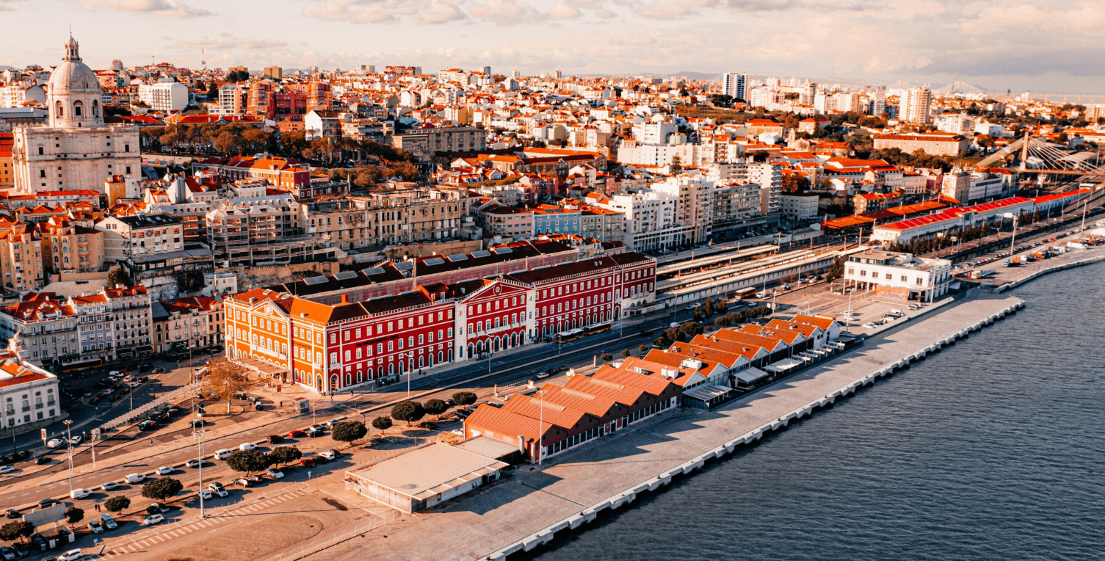 a city with many buildings and a body of water
