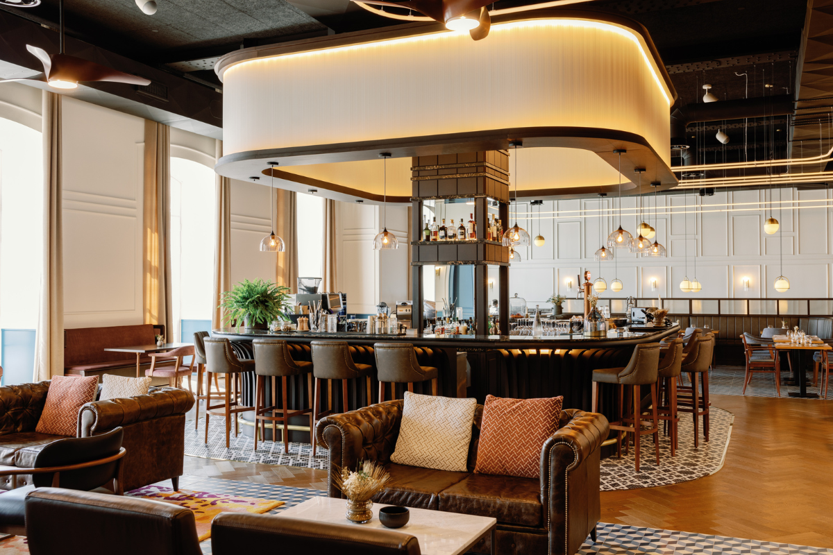 a bar with a bar and chairs