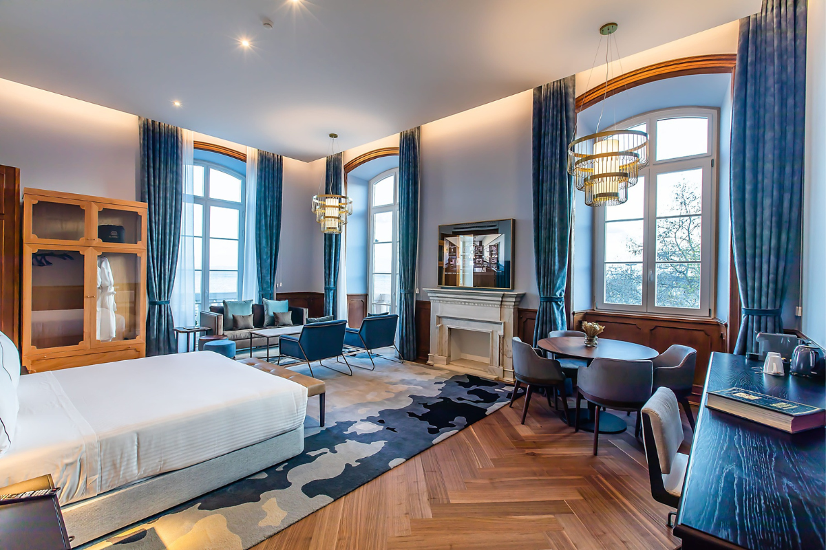 a room with a fireplace and a bed