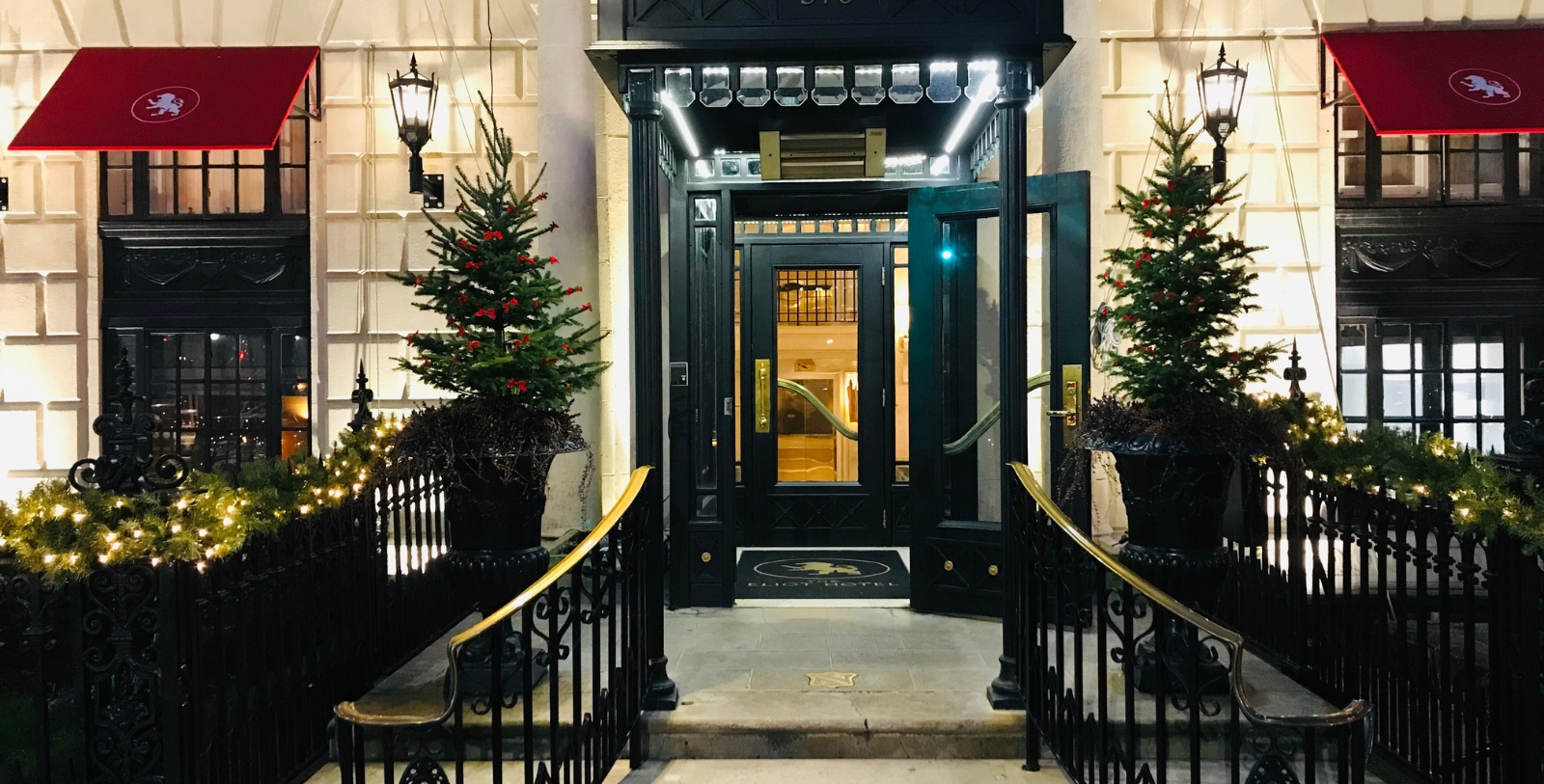 a building with a glass door and a railing