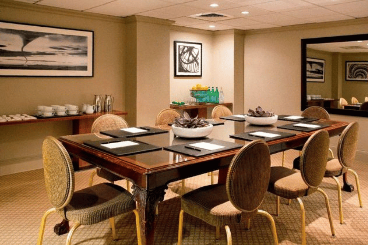 a room with a table and chairs