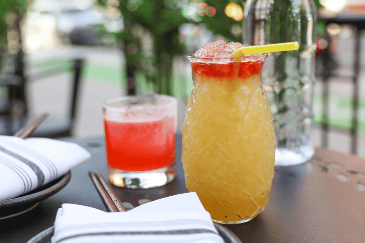 a glass with a drink in it