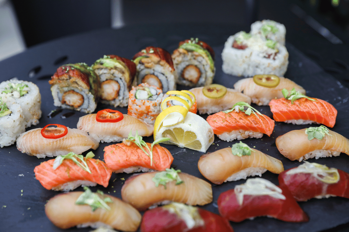 a plate of sushi on a grill