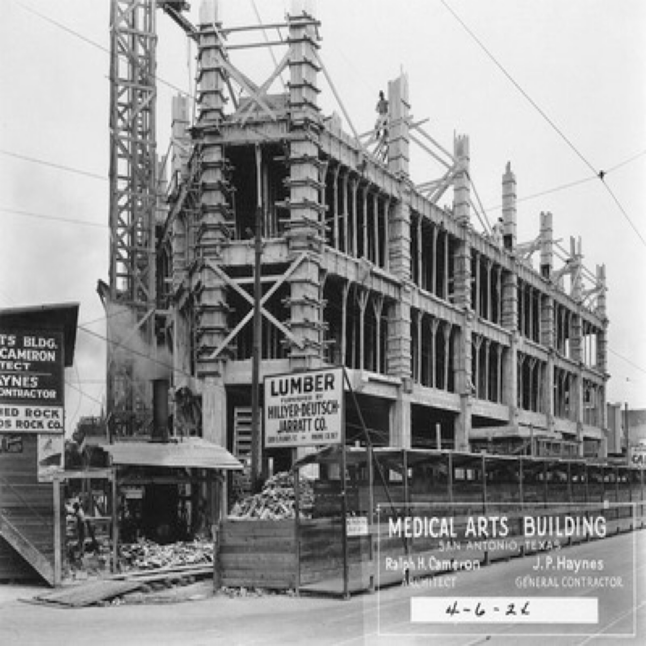 a building under construction with signs