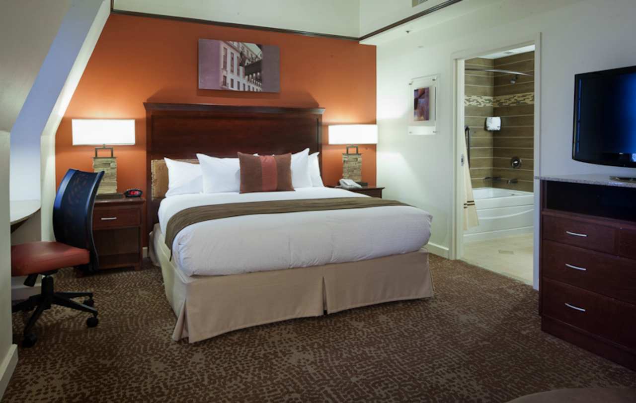 a bed in a hotel room