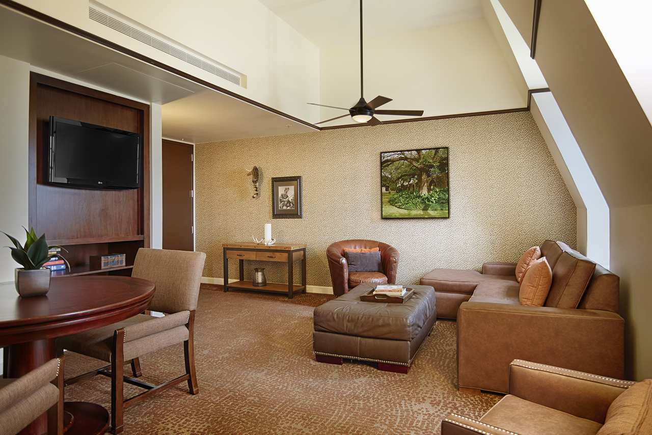 a room with a table and chairs