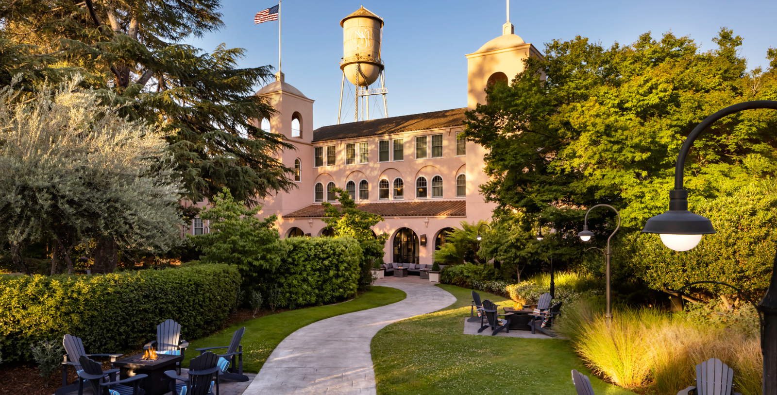 a building with a water tower in the background