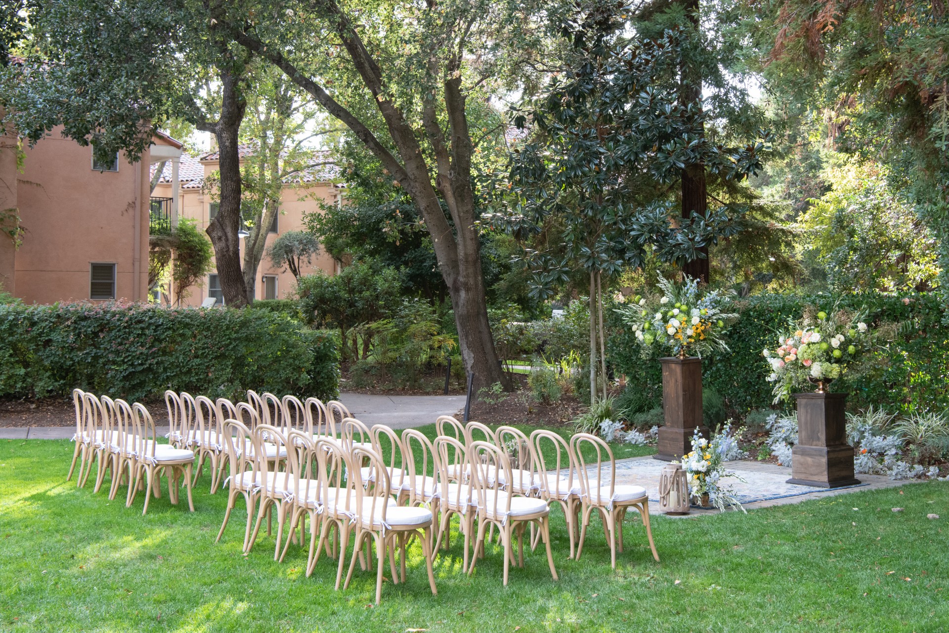 a group of chairs in a garden