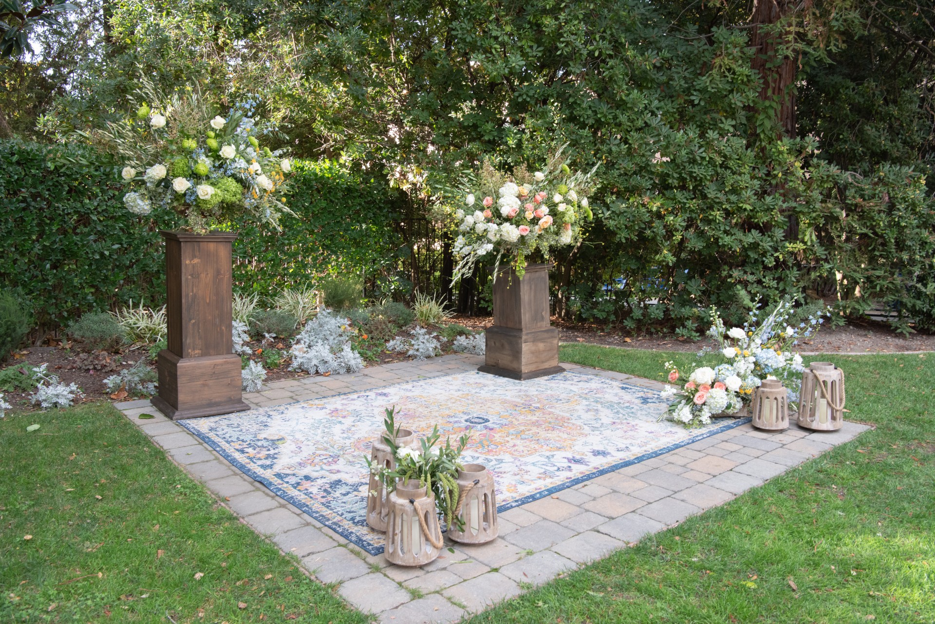 a group of flowers on a rug