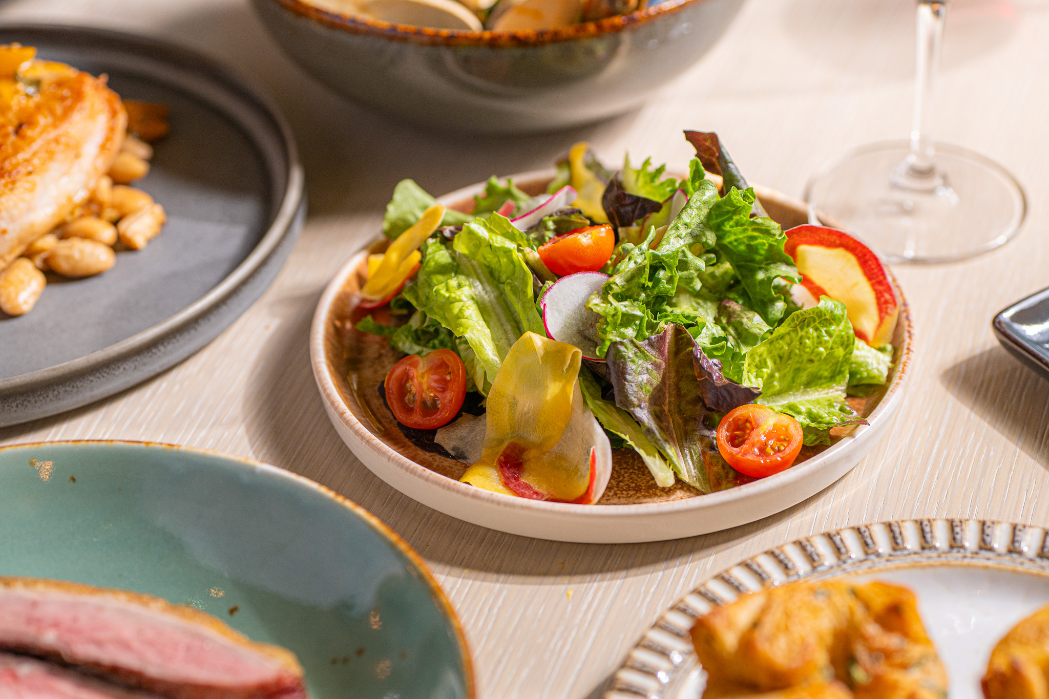 a plate of salad on a table